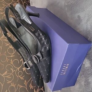 Stuart Weitzman Janet black mesh and leather slingback shoes.
